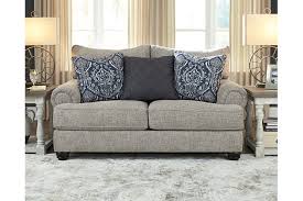 The piece of furniture is actually a multipurpose gem: Morren Sofa Loveseat Chair And Ottoman Ashley Furniture Homestore