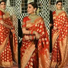 Facebook Right from anushka sharma wearing red banarasi saree in her reception to deepika padukone wearing red kanjivaram in her pheras, these traditional banarasi sarees are the permanent fashion statement!