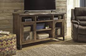 They save space, look great, and add an inviting feel to the ambience of the room. Signature Design Esmarina Large Tv Stand With Fireplace Audio Option Walnut Brown W815 48 Hvl Electronics Furniture