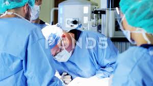 Surgical Healthcare Medical Training Team In Scrubs In The Hospital Operating Stock Footage Training Team Medical Surgica Medical Training Medical Health Care