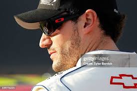 Jake Crum, driver of the Bandit Chippers Dodge, walks