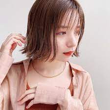 カジュアルでも女性らしい ひし形ショートボブ 原宿の美容室 ガーデンハラジュク garden harajuku スタイリスト 高橋 苗 タカハシ ナエ のヘアスタイル 髪型 ヘアカタログ lala ララ 髪色 オレンジ ボブ スタイリング ヘアスタイル