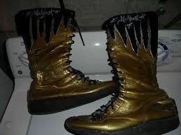 Beneath the platinum blond wig, sleek latex and gobs of gold face paint is the son of wwe hall of famer dusty rhodes. Wwf Wwe Ring Worn Goldust Gold Dust Boots Dustin Runnels Wrestling Boots Signed 403581496