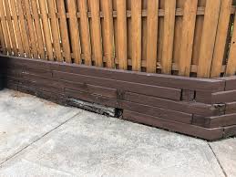 Then drill appropriate holes for the rebar to stick through and slide the timber into place over the rebar rods. Timber Retaining Wall Beam Replacement Home Improvement Stack Exchange