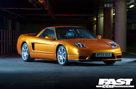 As car design has moved on and gloss black is now all the rage, the nsx has ditched its front chrome grille and gone for a black finish that further expands to the air intake mesh and rear bumper mesh. Honda Nsx Na2 Road Test Fast Car