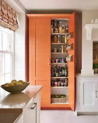 House Beautiful Uk On Instagram Elevate Your Kitchen Space With This Colourful Orange Larder With Multi Kitchen Larder Kitchen Remodel Kitchen Pantry Design
