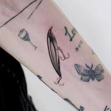 Table of contents plug lure tattoo on forearm colorful fishing lure 30 Tattoos You Won T Believe Are Actually Tattoos Tattooblend