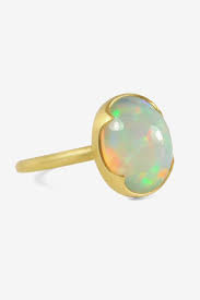 Australian opal and tanzanite ring, solid gold band with 3mm & 1.5mm stones. 30 Beautiful Opal Engagement Rings Unique Opal Engagement Rings For Brides