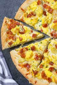 Easy Breakfast Pizza Recipe Begins With Homemade Pizza Dough Topped With Crisp Bacon Bits Scrambled Egg Breakfast Pizza Recipe Breakfast Pizza Homemade Pizza