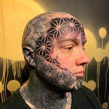 Pin op tattooed face