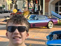 Not one but two 2nd gen Firebirds driving by The Whisky club in the 70s