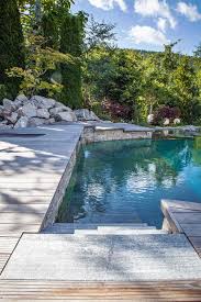 Mit Steinen Ummantelt Statt Mit Folie Kalhofer Gartengestaltung Schwimmteiche Landschaftsbau Garten Gartengestaltung Schwimmteich Garten Landschaftsbau