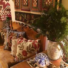 busting out the wintry quilts and filling every pitcher vase and vessel with holly and evergreens any container kim diehl quilts kim diehl quilt display pinterest