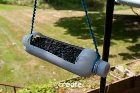 Popsicle stick swing bird feeder. Upcycled Plastic Bottle Bird Feeder Craft Create Cook
