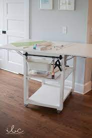 Slide the legs and apron back when the drop leaf is folded down. Build Your Own Drop Leaf Work Or Craft Cart Inbetweenchaos Com Craft Cart Craft Table Diy Craft Table