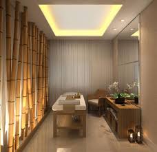 White walls, a pale blue rug and classic brown leather seating offer try wooden wall decor for size, like this grey and white living room with coloured wood at its centre. Massage Room With Bamboo Spa Room Decor Spa Massage Room Spa Rooms