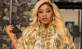 Hours after posing as a nun in a revealing… Photos Toyin Lawani Announces Her Marriage To New Boyfriend
