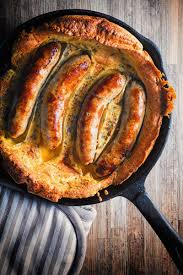 Easy Toad In The Hole In A Cast Iron Skillet Recipe Easy Yorkshire Pudding Recipe Yorkshire Pudding Yorkshire Pudding Recipes