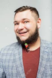 Long hairstyles for men in 2021. Close Up Portrait Of Young Happy Fat Man With Hair Clips On Long Stock Photo Picture And Royalty Free Image Image 83353506