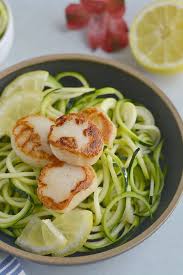 An easy recipe for baked scallops with a wonderful sauce of butter, lemon, and parmesan. Whole30 Scallops Zucchini Noodles Low Carb Gf Skinny Fitalicious