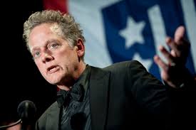 Musician Michael Bacon addresses the audience after he received the Merit  Service Award at the annual USO Gala in Arlington, Va., April 14, 2010. His  brother, actor Kevin Bacon, received the same award.