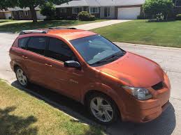 Image result for Sunburst Orange 2004 Pontiac