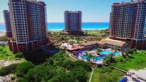 Portofino island resort has abundant onsite amenities for guests, including five tennis courts, several restaurants, a condo rentals at portofino island resort can accommodate groups up to 12 people. This Is Portofino Life Pensacola Beach Florida Luxury Vacation Rentals Youtube