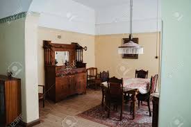 The juxtaposition of the rustic colonial dining table with the modern streamlined silhouette of their new west elm chandelier is perfect. Dining Room At Historic Colonial House Villa Stock Photo Picture And Royalty Free Image Image 137570724