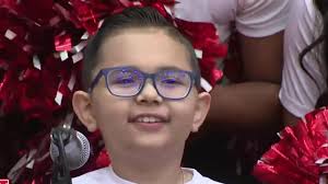 Cougars welcome honorary member of the program