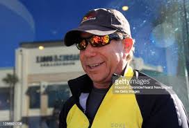 Retired Continental Airlines pilot, Eric Hochberg, sits outside of... News  Photo