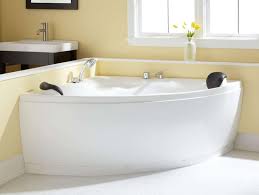 Corner tub is combined with shower surrounded by traditional white curtains hanged on industrial bronze bar (matches the vintage shower head). Corner Freestanding Tub Ideas On Foter