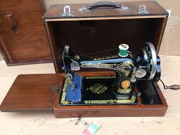 Image result for singer 28k