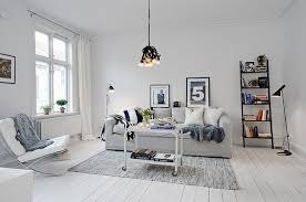 The key to make the black and white bedroom dramatic is to create a balance between these two hues. Charming White Apartment With Few Black And Grey Decorations Freshnist