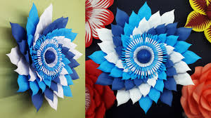 It's such a perfect size and shape for that large blank stretch of wall above our dresser drawers. Colors Paper Diy Paper Flowers Wall Decorations Paper Flower Tutorial With Free Tem
