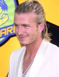 Sometimes (and recently) he has worn it short, and other times quite long. David Beckham With Long Hair