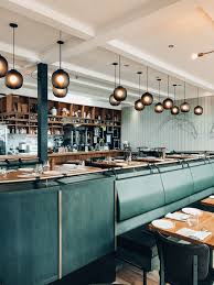 Home Decor Inspo A Beautiful Green Interior In A Cafe Restaurant Interior Cafe Interior Restaurant Interior Design