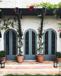Black And White Spanish Style Home Exterior Arch Exterior Doors Teal Blue Exterior Doors Photograph By Amybartlam Arched Exterior Doors Spanish Exterior Door Color