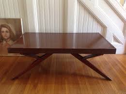 Castro convertible coffee/dining table, third quarter 20th century, rectangular top coffee table raises and swivels to convert to a dining table raised on four angular legs, dimensions as a coffee table: Pin On For The Home