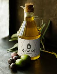 Two oil bottles and handful olives. Free Rustic Look Olive Oil Bottle Mockup Scene Free Package Mockups