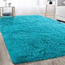 Sturdy, reinforced cotton canvas backing protects the carpet and adds a layer of cushion. Amazon Com Teal Rugs