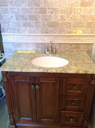 Our Walnut Ridge Vanities Are In Stock Everyday These Cabinets Are A Top Seller For Us At Knox Rail Salvage Treat Yourse Home Kitchen Vanity Home Improvement White quartz counters with stainless steel hood and brass pendant light fixtures.