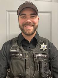 The Grand Traverse County Sheriff's Office held its first no shave  November! We need your help to decide who grew the best beard. To vote for  your favorite deputy's beard react to