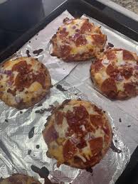 This low carb crispy pizza crust is made in a mini waffle maker with almond flour, an egg, cheese and seasoning. Keto Pizza Chaffle