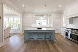 Gorgeous Blue And White Kitchen Boasts Two Regina Andrew Globe Pendants Hung Over A Powder Blue Kitchen Islan Blue Kitchen Island Home Kitchens Kitchen Remodel