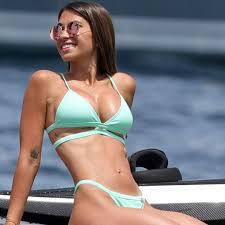 Antonela Rocuzzos best bikini moments with her husband Lionel Messi