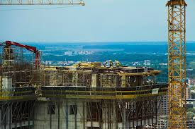 Three workers, jeffrey wischer, william. Royalty Free Photo Gray And Blue Building Pickpik