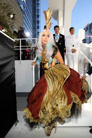 Lady Gaga S Style Evolution From A Meat Dress To Custom Versace Lady Gaga Outfits Lady Gaga Fashion Meat Dress