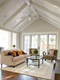 A ceiling fan is a hardworking household appliance, and choosing one that will last starts with what's inside. 5 Best Ceiling Fans For High Ceilings You Can Buy Today Advanced Ceiling Systems High Ceiling Living Room Cathedral Ceiling Living Room Vaulted Ceiling Living Room