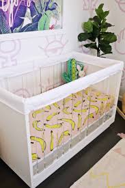 Easy and affordable diy solution for creating a toddler bed rail bumper to prevent kids from falling off their beds with pool noodles. Padded Crib Rail Cover Diy A Beautiful Mess
