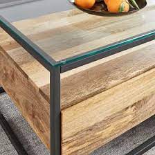 Each is made in a fair trade certified™ facility. West Elm Box Frame Storage Coffee Table